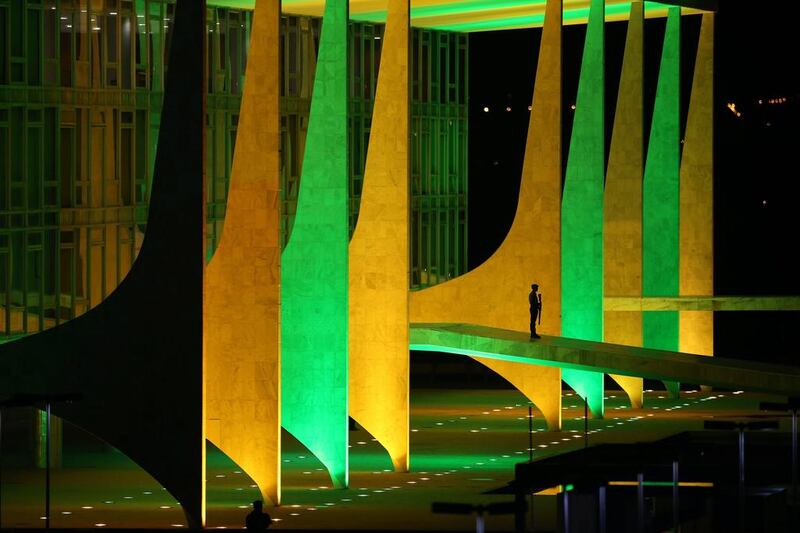 View of the Planalto Palace illuminated with yellow and green colours as a tribute to the Brazilian national football team for the upcoming Fifa World Cup Brazil 2014, in Brasilia, Brazil. Fernando Bizerra Jr. / EPA
