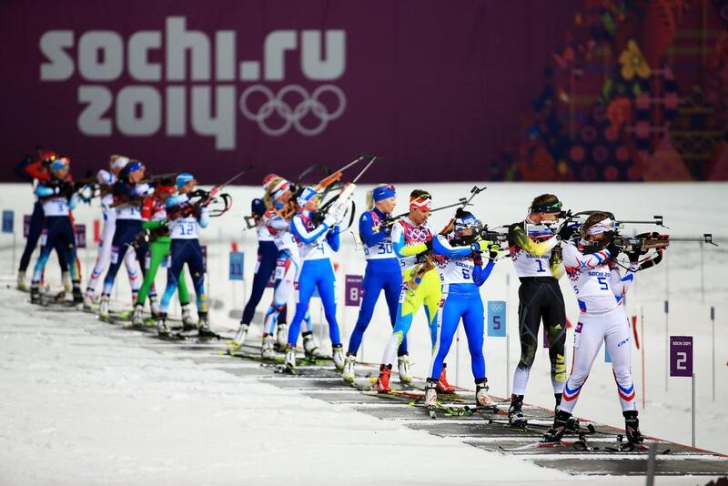 From right, Anais Bescond of France, Anastasiya Kuzmina of Slovakia and Dorothea Wierer of Italy compete in the women's 10 km pursuit at Laura Cross-Country Ski & Biathlon Center on Tuesday in Sochi.  Richard Heathcote / Getty Images