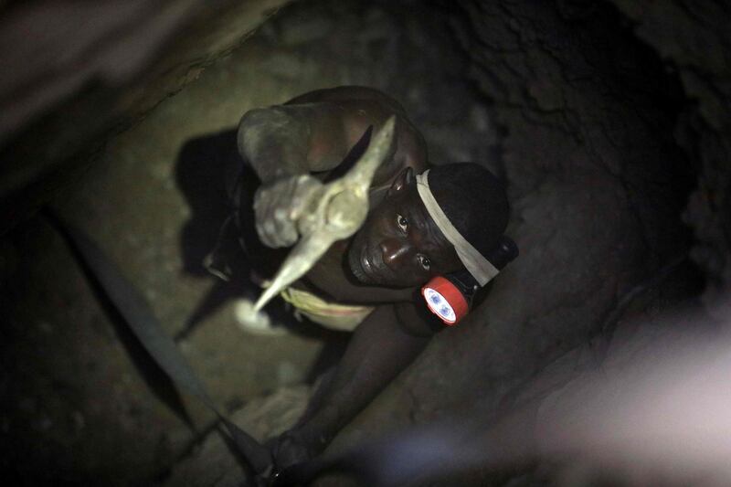 A gold miner works underground in Anka near Gusau. AFP