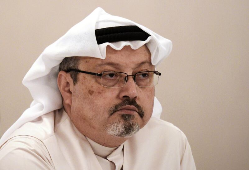 (FILES) In this file photo taken on December 15, 2014 Saudi journalist Jamal Khashoggi attends a press conference in the Bahraini capital Manama. Saudi Arabia is attempting a comeback on the global stage one year after  Khashoggi's murder, but the crisis has weakened it and undermined its de facto leader's ambitious reforms, analysts say. / AFP / MOHAMMED AL-SHAIKH
