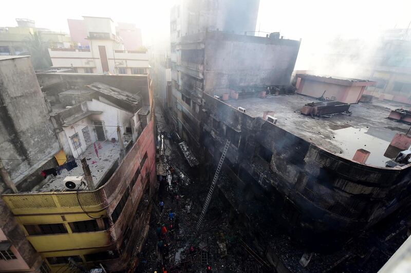 Burnt buildings are seen after the fire broke out in Dhaka. AFP
