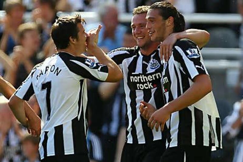 Newcastle goalscorers Joey Barton, left, who opened the scoring, Kevin Nolan, centre, who bagged a brace, and Andy Carroll, the hat-trick hero, celebrate a stunning performance against Aston Villa.