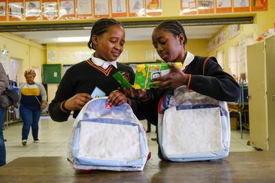 200 recycled bags were donated to children at a school in one of Johannesburg's poorest neighbourhoods. Courtesy Emirates 