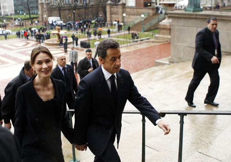 President Nicolas Sarkozy and his wife Carla Bruni arrive to address a World Leaders Forum at Columbia University in New York yesterday.
