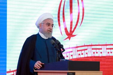 President Hassan Rouhani told the United States to "take the first step" by lifting all sanctions against Iran, a day after US President Donald Trump said he was open to meeting. AFP