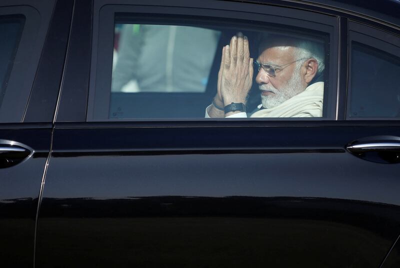 Mr Modi leaves after the funeral in Gandhinagar. Reuters