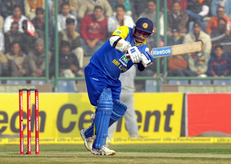 Sri Lankan cricketer Sanath Jayasuriya plays a stroke during the fifth and final One Day International (ODI) cricket match between India and Sri Lanka at The Feroz Shah Kotla Cricket Ground in New Delhi on December 27, 2009.    Indian captain Mahendra Singh Dhoni won the toss and sent Sri Lanka in to bat in the fifth and final one-day international. India, enjoying an unassailable 3-1 lead in the series, rested star batsman Sachin Tendulkar and brought in seamer Sudeep Tyagi for his one-day debut.  AFP PHOTO/RAVEENDRAN (Photo by RAVEENDRAN / AFP)