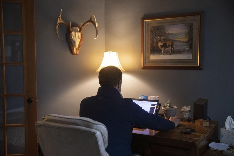 A person works from home on a laptop computer in Princeton, Illinois, U.S., on Friday, Sept. 11, 2020. Illinois reported 1,337 new coronavirus cases Wednesday as the state's positivity rate dropped below 4% for the first time in weeks. Photographer: Daniel Acker/Bloomberg