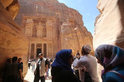 Tourists at Petra, Jordan's most famous tourist attraction. The WTM report predicts a 104 per cent rise in the value of inbound tourism in Jordan in the next 10 years. Getty Images