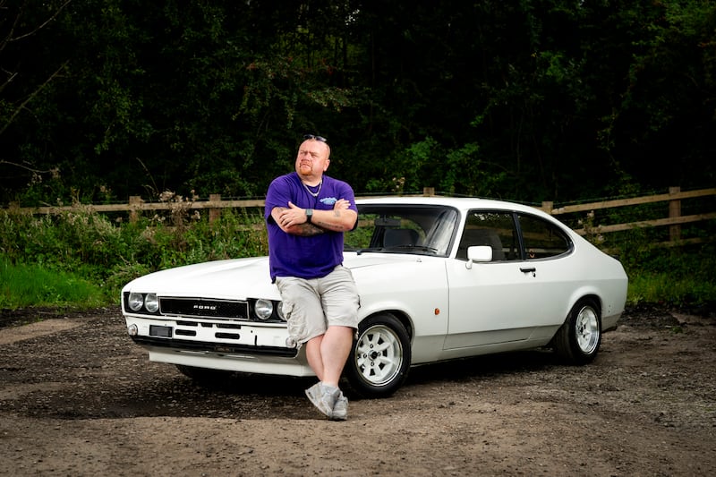 Jay McDonald, 45, a haulier in Hayes, West London, with his 1986 Mark 3 Ford Capri. 'It's a tax on the people, it won't achieve anything more than putting money in the pockets of TfL'