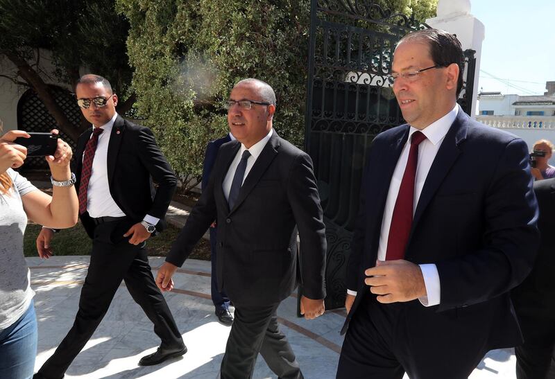 Tunisia's Prime Minister-designate Hichem Mechichi welcomes  former head of government, Youssef Chahed during consultations as part of the formation of the next government in Tunis, Tunisia. EPA