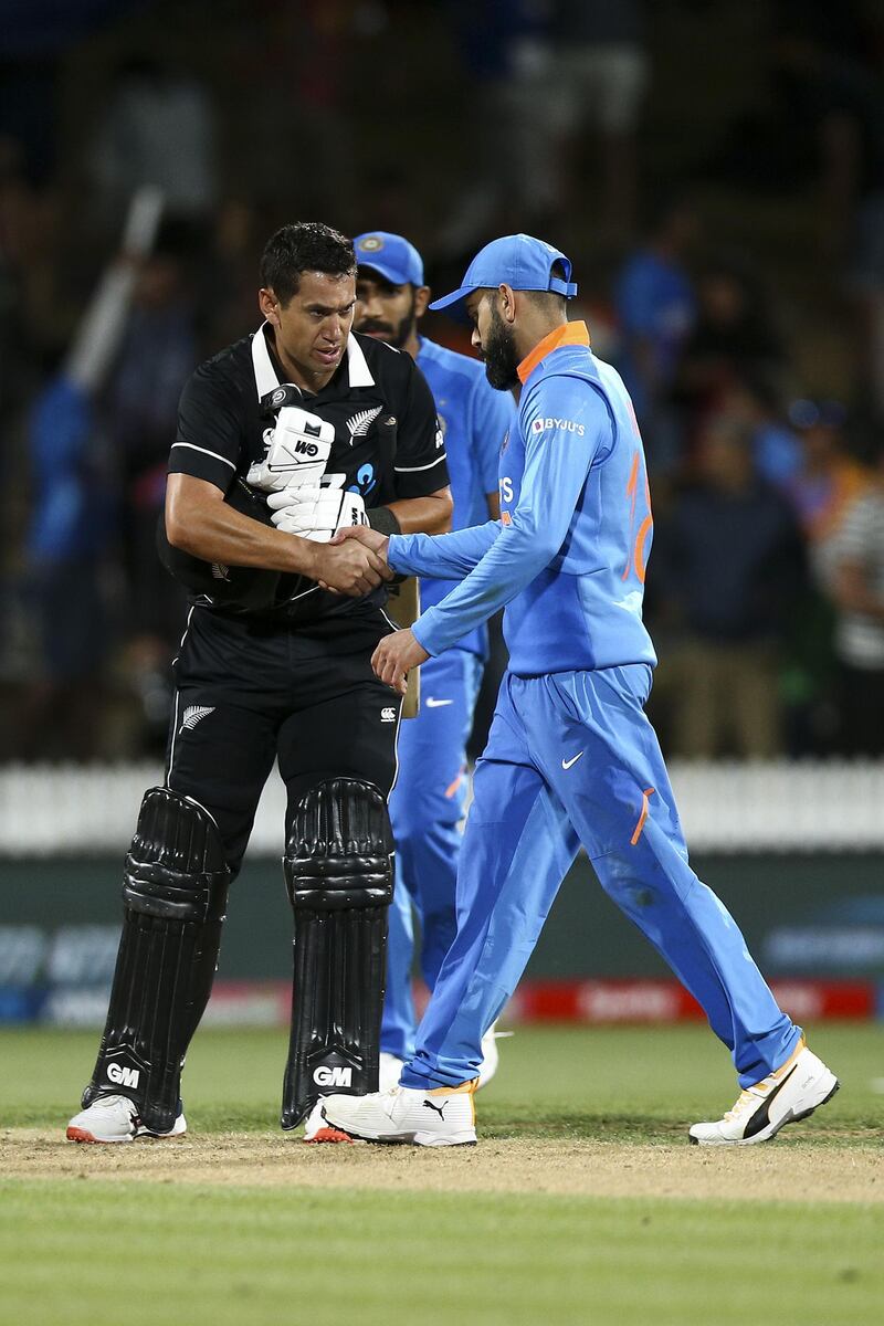 Ross Taylor shakes hands with Virat Kohli at the conclusion of the first ODI at Seddon in Hamilton. Getty Images