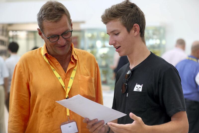 Dubai, United Arab Emirates - August 16, 2018: Jumeirah College pupil Karl Watrelot with his dad Olivier Watrelot as the A-level results are announced. Thursday, August 16th, 2018 at Jumeirah College, Dubai. Chris Whiteoak / The National