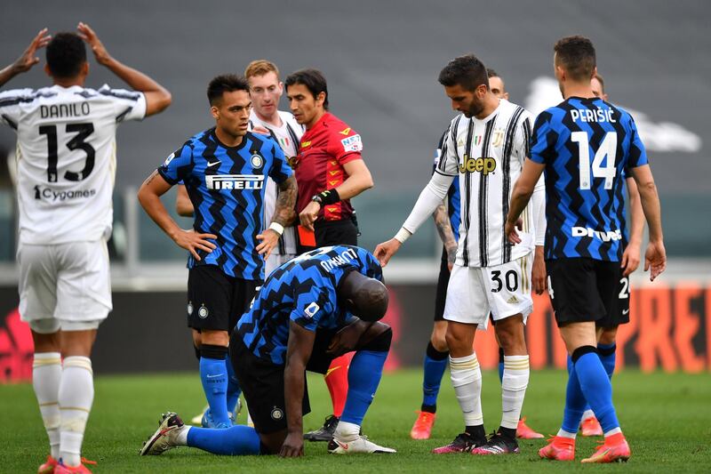 Juve's Rodrigo Bentancur checks on Romelu Lukaku of Inter. Getty