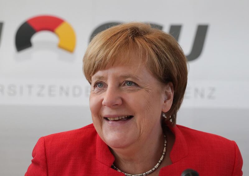 epa06716814 German Chancellor Angela Merkel arrives to attend a meeting of CDU/CSU parliamentary group leaders of regional parliaments in Frankfurt Main, Germany, 07 May 2018.  EPA/ARMANDO BABANI / POOL
