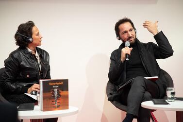 Iraqi oud musician Naseer Shamma (right) discusses his book with German singer Michele Adamski at the Frankfurt Book Fair on October 16, 2019. Courtesy Kalima