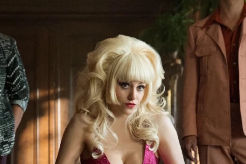 It took a team of makeup artists 11.5 hours the first time they transformed Emmy Rossum into Angelyne in the TV series based on her life, using wigs, bodysuits, lenses, and a breastplate. Photo: NBC Universal