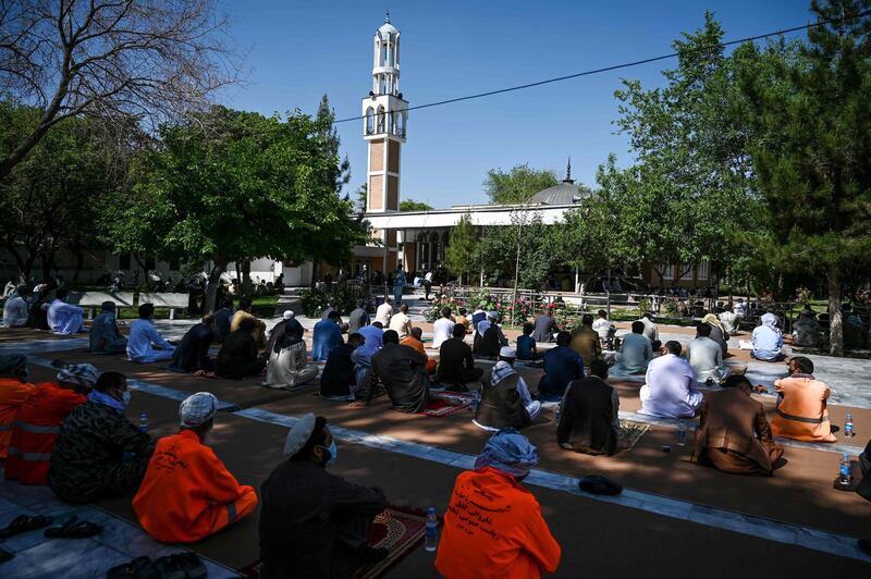 Muslims offer prayers at the start of the Eid Al Fitr at the Wazir Akbar Khan mosque in Kabul on May 24, 2020. AFP