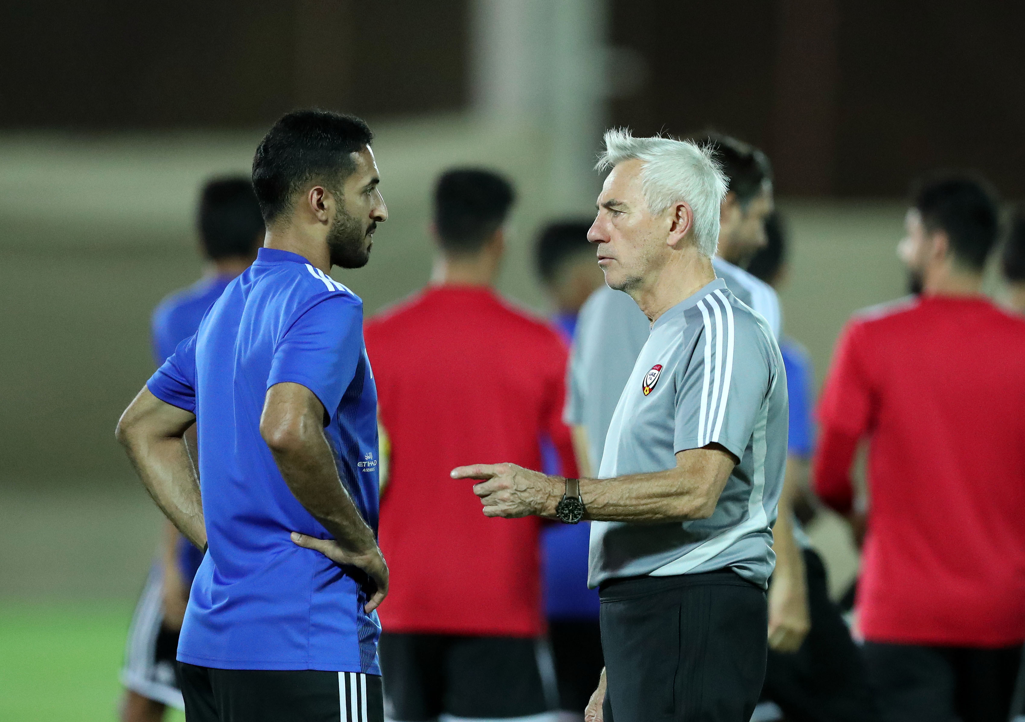 UAE manager Bert van Marwijk speaks with Ali Mabkhout during training before the World Cup qualifier against Lebanon at Zabeel Stadium in Dubai.