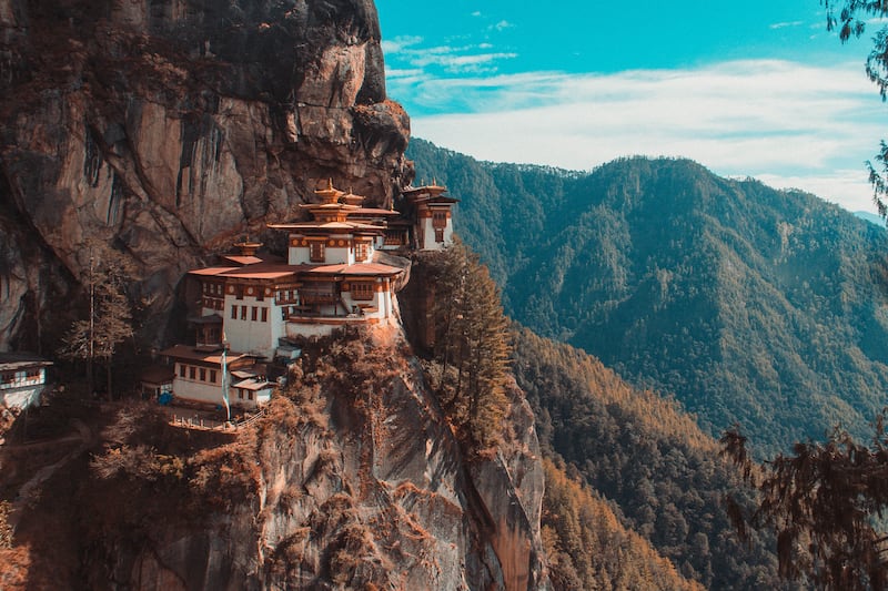 Bhutan is halving tourism fees from $200 per day in a bid to attract visitors. Photo: Unsplash / Aaron Santelices