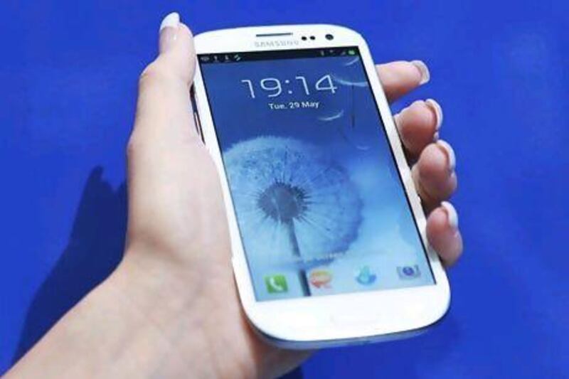 The Galaxy SIII phone has a 4.8-inch display and can track its user's eye movements to ensure the screen does not dim or turn off when in use. Reuters