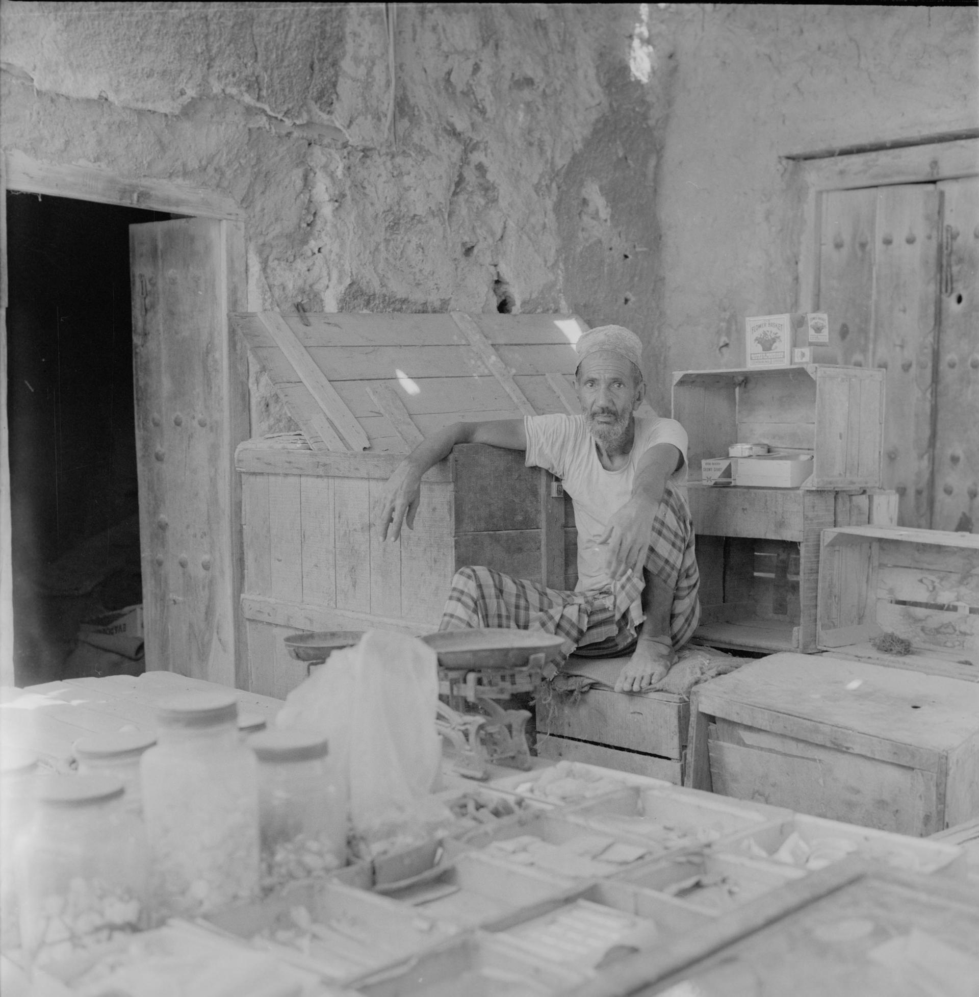 Another trader in the Abu Dhabi souq around 1962. The Flower Box matches he is selling still use the same packaging today. Courtesy: Guy Gravett