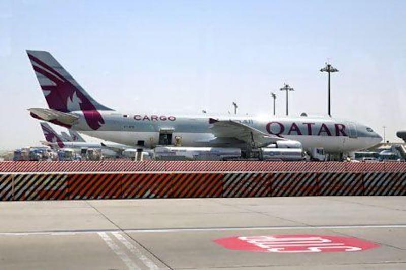 A Qatar Airways cargo plane at the Doha International Airport. Qatar has outlined its ambitious vision for growth. Randi Sokoloff / The National