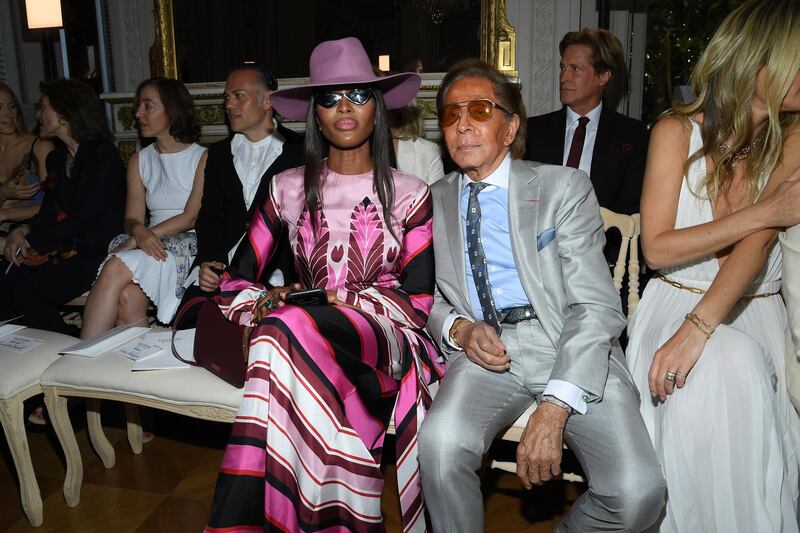 Naomi Campbell, in Valentino, and Valentino Garavaglia attend the Valentino show on July 3, 2019 in Paris, France. Getty Images