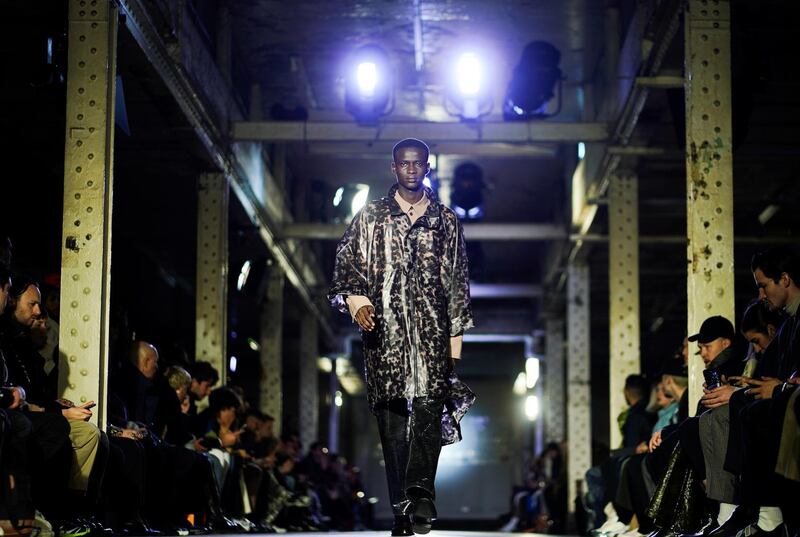 For Autumn/Winter 2020, Qasimi turns&nbsp;tortoiseshell into loose raincoats at London Fashion Week Men's. Reuters