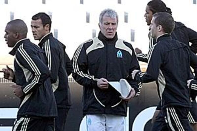 Marseille's coach Eric Givets, centre, wants his team to make up for their Uefa Cup quarter-final defeats in previous years.