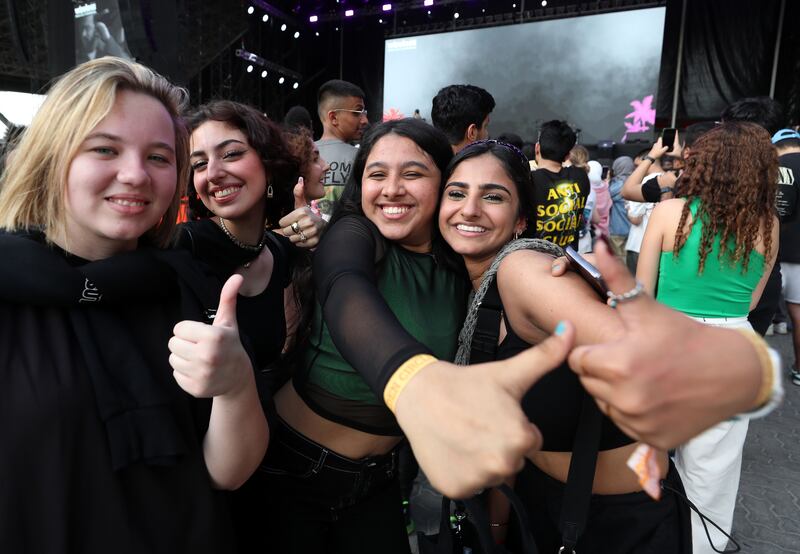 Happy fans in attendance give the thumbs up at Wireless Festival Middle East 