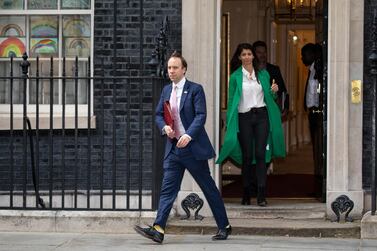UK Health Secretary Matt Hancock leaves 10 Downing Street followed by his aide Gina Coladangelo earlier this year. Getty