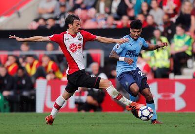 Soccer Football - Premier League - Southampton vs Newcastle United - St Mary's Stadium, Southampton, Britain - October 15, 2017   Southampton's Manolo Gabbiadini in action with Newcastle United's DeAndre Yedlin             REUTERS/Eddie Keogh    EDITORIAL USE ONLY. No use with unauthorized audio, video, data, fixture lists, club/league logos or "live" services. Online in-match use limited to 75 images, no video emulation. No use in betting, games or single club/league/player publications. Please contact your account representative for further details.