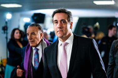 Michael Cohen departs after testifying privately before the Senate Intelligence Committee. EPA