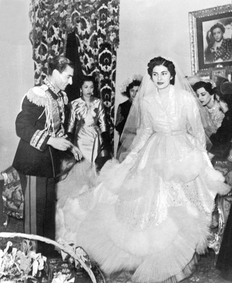 A picture dated 14 February 1951 shows late Shah of Iran Mohammed Reza Pahlavi (L) and his second wife, Soraya Esfandiary (R), on their wedding day in Tehran. Soraya Esfandiary had died of natural causes at the age of 69 in Paris, police officials said 25 October 2001. (Photo by AFP)