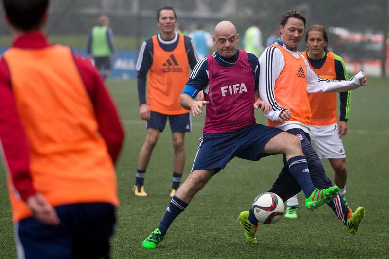 New Fifa president Gianni Infantino (C) plays the ball during a Fifa Team Friendly Football Match at the Fifa headquarters on February 29, 2016 in Zurich, Switzerland. (Photo by Philipp Schmidli/Getty Images)