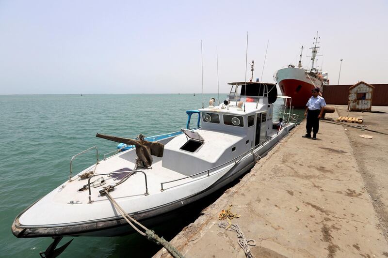 FILE PHOTO: A Yemeni local coast guard looks on after his deployment at Hodeidah port in Hodeidah, Yemen May 13, 2019. REUTERS/File Photo