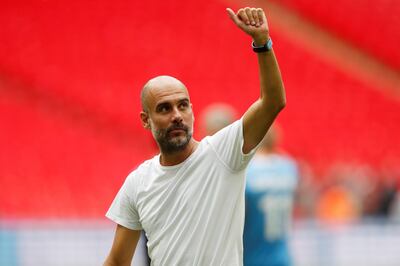 Soccer Football - FA Community Shield - Manchester City v Liverpool - Wembley Stadium, London, Britain - August 4, 2019  Manchester City manager Pep Guardiola  gestures to fans after winning the FA Community Shield   Action Images via Reuters/Matthew Childs