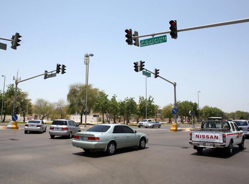May 25, 2009 / Abu Dhabi / Cars run a red light at the intersection of 11th Street and 24th Street May 25, 2009. (Sammy Dallal / The National)

 *** Local Caption ***  sd-052509-redlight-01.jpg
