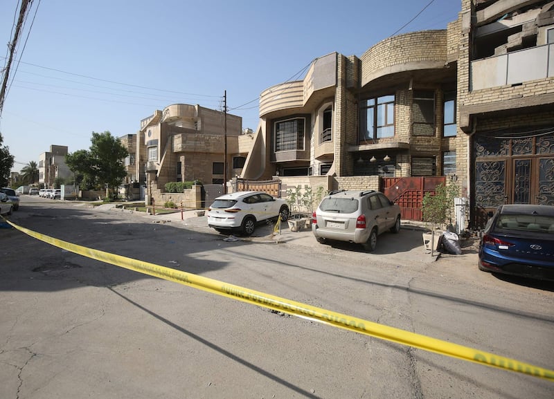A general view shows the spot where Iraqi extremism expert Husham Al Hashimi was shot dead yesterday outside his house in the Iraqi capital Baghdad’s Zeyouneh district. AFP