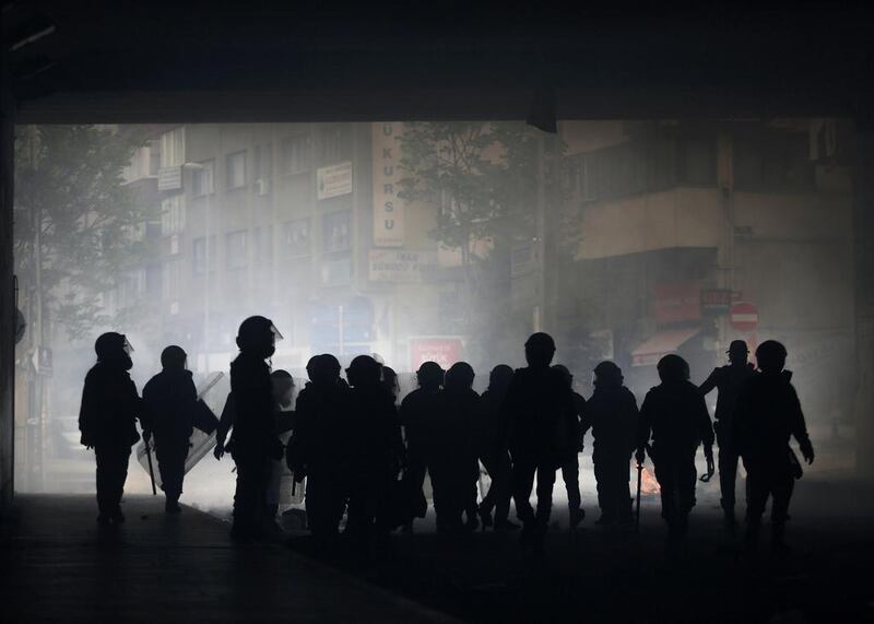 Riot police take up position during a May Day demonstration in Istanbul. Turkish police fired water cannon and tear gas to prevent hundreds of protesters from defying a ban on May Day rallies. Serkan Senturk / Reuters