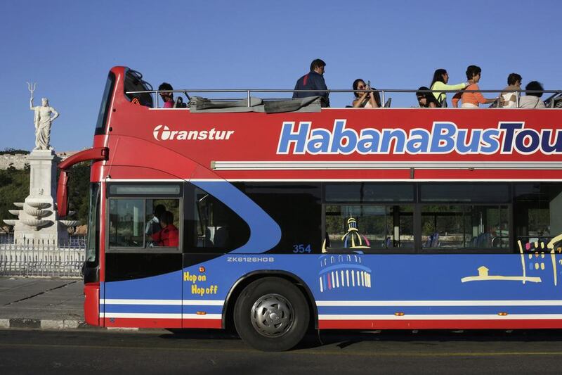 A double-decker bus waits for tourists to board in Old Havana. Enrique De La Osa / Reuters
