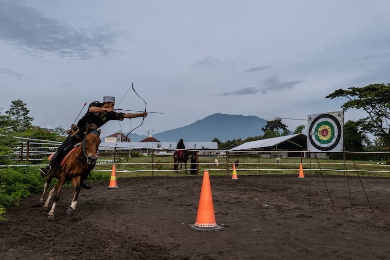 A student takes part in horseback archery practice at the Islamic Al Fatah Temboro boarding school in Magetan, East Java, Indonesia. Getty Images