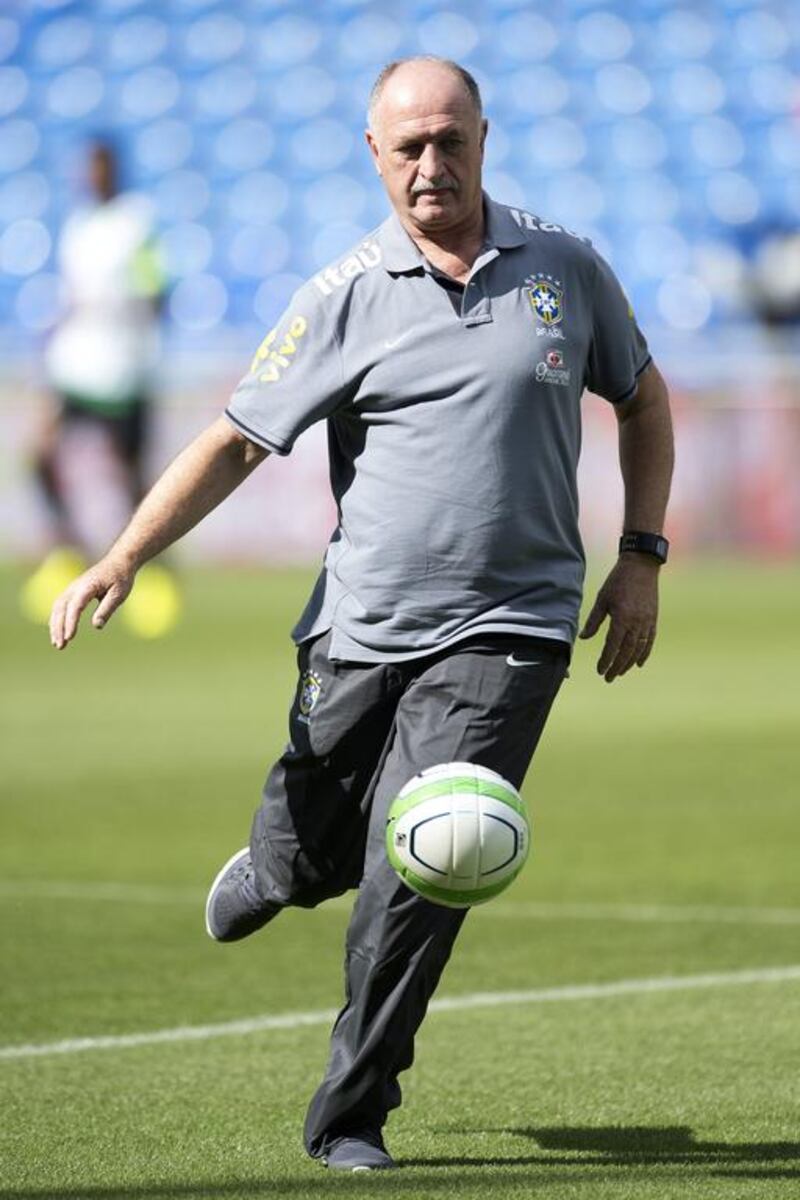Brazil coach Luiz Felipe Scolari, pictured during a training session in Basel, Switzerland, on August 13, 2013, could spend up to 17 years in prison if convicted of tax fraud and money laundering. Georgios Kefalas / AP Photo