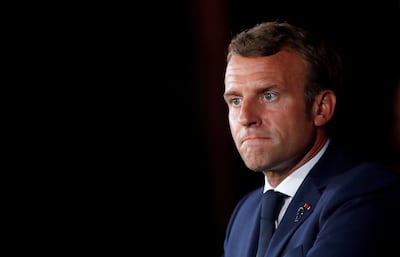 FILE PHOTO: French President Emmanuel Macron looks on as he attends a news conference at the Pine Residence, the official residence of the French ambassador to Lebanon, in Beirut, Lebanon September 1, 2020. REUTERS/Gonzalo Fuentes/Pool/File Photo