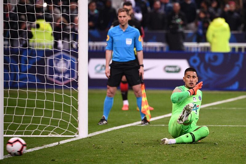 PSG keeper Alphonse Areola fails to catch a ball kicked by Rennes forward Mbaye Niang during the penalty shootout. Martin Bureau / AFP