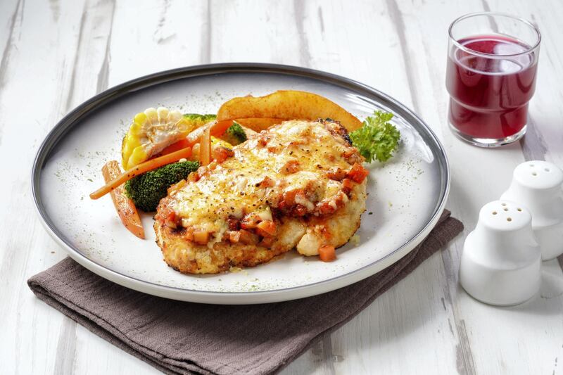 Chicken Parma serve with potato wedges