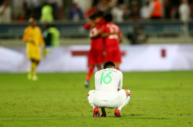 Saudi Arabia's Sultan Abdullah Al Ghanam looks dejected after the match. Reuters