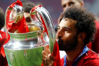 Liverpool's Mohamed Salah kisses the Champions League trophy after beating Tottenham 2-0 in the final in Madrid on June 1, 2019. Reuters