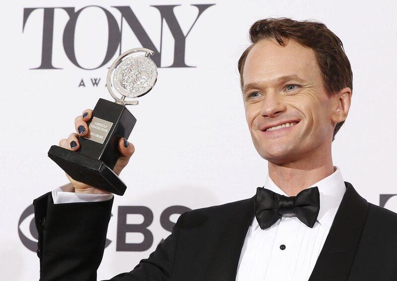 Neil Patrick Harris poses backstage with his Tony Award for Best Performance by an Actor in a Leading Role in a Musical for Hedwig and the Angry Inch. Reuters 